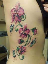 Left Shoulder Orchid Tattoo Design For Girls In 2020 Orchid Tattoo Butterfly Tattoo Rib Tattoo