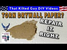 One face is very smooth and is the surfacing face and the other is more of a kraft paper backing face. Repair Damaged Torn Drywall Paper Before You Mud It Youtube