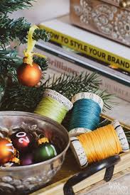 Floral table runners draw the eye down the length of the table and the arrangement of flowers in colour blocks make the setting feel fresh and modern. How To Decorate The Coffee Table For The Holidays Casa Watkins Living