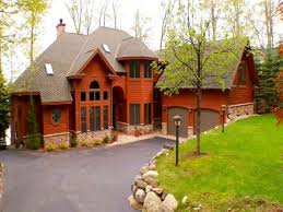 In the winter we enjoy our cosy weekends in the cottage skiing and tubing and coming back home to the cottage the lake is so dramatic in the depths of the winter, we spend many weekends enjoying skiing and walking. Amazing Northern Michigan Homes Torch Lake Beauty