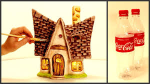 You can make an adorable fairy house for your fairy garden with an empty laundry detergent or fabric softener bottle. Diy Little Fairy House Lamp Using Coke Plastic Bottles Youtube