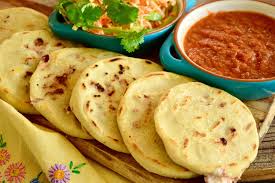 Made from masa dough, the base for tortillas, tamales and other latin cooking staples, pupusas are. Pupusas De Chicharron Salvadoran Pork Stuffed Masa Cakes Suellen Pineda