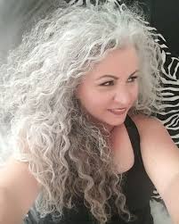 I Love That I Let My Hair Go Natural The Curl And The Grey Are All Me Long Grey Curly Hair Curly Hair Styles Curly Hair Styles Naturally Long Gray Hair
