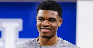 Kentucky coach and recruit in heated argument