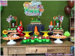 Make a cool display with a giant martini glass, a cake stand and a couple glow bracelets around the plate rim. Kara S Party Ideas Plants Vs Zombies Themed Birthday Party