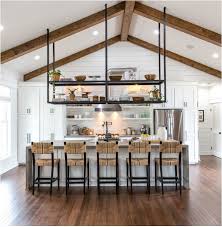 Metal kitchen shelves industrial looking ceiling light. Trending Suspended Kitchen Shelving Centsational Style