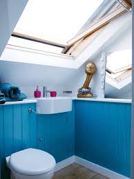 Walls of sky blue glass subway tiles give off the reflective qualities of water in this simple bathroom. Small Bathrooms In Blue And White Trendy And Timeless Duo