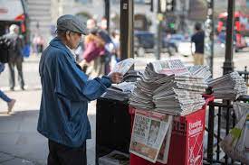 673 Man Selling Newspapers Stock Photos, Pictures & Royalty-Free Images -  Istock