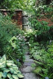 21 Exciting River Rock And Stone Garden Decorating Ideas For Your Outdoor Space In 2020 Shade Garden Design Vertical Garden Herb Garden Design