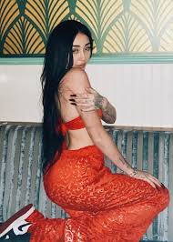 Experience Noah Cyrus's raw beauty