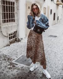 Black And White Cheetah Print Skirt Denim Jacket Over Trendy Leopard Print Maxi Skirt With White Tee And Sneakers Animal Print Skirt Outfit Printed Skirt Outfit Printed Maxi Skirts