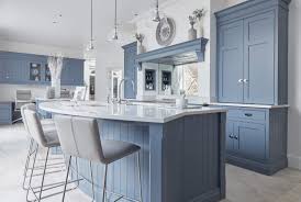 Whether your goal is a full makeover or simply sprucing up your space, when it's time for a kitchen makeover, you want to know what's in, what's out, and what's here to stay. Blue Kitchen Design Tom Howley