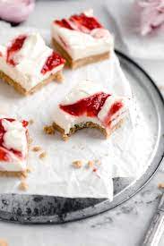 Simply wrap individual slices or the entire cheesecake—without the topping—in plastic wrap or aluminum foil. No Bake Strawberry Cheesecake Bars Broma Bakery