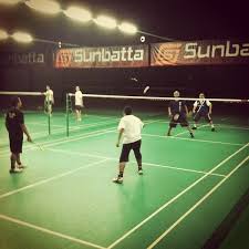 The net divides the court into two halves. White Fairy Sports Badminton Court In Puchong