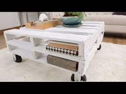 This coffee table is made from 3 pallets, castors and a glass top. How To Create A Pallet Coffee Table In One Afternoon Eye On Design Youtube