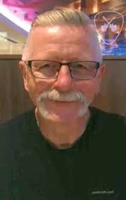 John B. Hauptmann, beloved husband, father, grandfather, and friend, passed  away peacefully