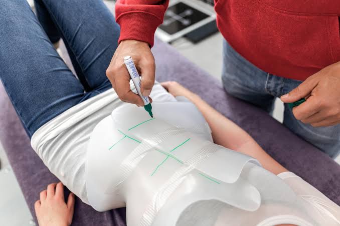 Routine follow-ups ensure the brace continues to apply the correct corrective forces as the child grows., AI generated