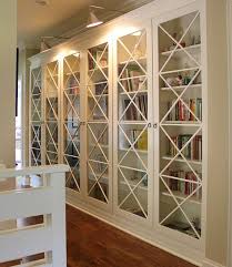 How easy is it to add glass doors to a fairly large shelving unit/bookcase? 15 Inspiring Bookcases With Glass Doors For Your Home