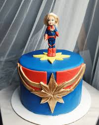 List of stunning shazam cake design image ideas that can inspire you to have custom cake designs for upcoming birthdays, weddings, anniversaries. Captain Marvel Cake Design Images Captain Marvel Birthday Cake Ideas