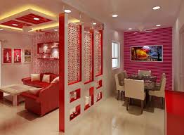 Wood planks laid horizontally in a randomly staggered manner recall wood floors or exterior siding. Living And Dining Room With A Partition By Jaideep Mandal