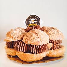 French bread & pastry recipes. Paris Brest French Pastry Puff With Chocolate Mousse Caramel Sauce And Almond Flakes Picture Of Java Flava Cafe Kuantan Tripadvisor