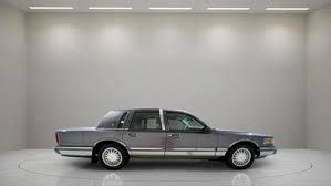 Image result for Ivory 1995 Town Car