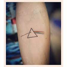 Lift your spirits with funny jokes, trending memes, entertaining gifs. 25 Pink Floyd Tattoos That Got Us Seeing The Dark Side Of The Moon Pink Floyd Tattoo Tattoos Rainbow Tattoos