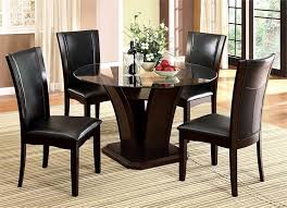 Deck out the dining room with rattan chairs to give the space some texture. Manhattan Round Glass Dining Table Round Glass Top Table
