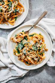 Creamy Spinach Sweet Potato Noodles With Cashew Sauce Pinch Of Yum Recipe Sweet Potato Spinach Sweet Potato Noodles Spiralizer Recipes