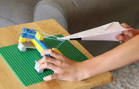 Como hacer un avion con papel resiclando. Construye Un Lanzador De Aviones De Papel Casero Experimentos