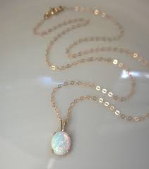 This Necklace Features A Mesmerizing Opal Gemstone You Wont Want To Take Your Eyes Off The Ir Opal Pendant Necklace October Birthstone Necklace Opal Necklace
