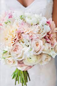 The wedding trends to keep and ditch in 2020, according to 20 top planners Hand Tied Bouquet White Blush Pink And Peach Flowers With Images Summer Wedding Bouquets Diy Wedding Flowers Wedding Bouquets