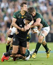New Zealand S Ma A Nonu Is Snuffled Up By The South African Defence Rugby Boys Rugby Men Rugby