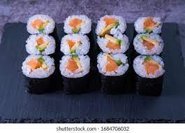 Salmon Makis On Slate Plate Concrete Stock Photo 1684706032 Shutterstock