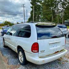 Image result for Bright Silver 2000 Caravan