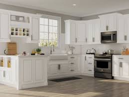 Home depot was hired to remodel my kitchen. Large And Open Kitchen With White Cabinets And Tile Backsplash Trim Around The Windows Home Depot Kitchen Kitchen Cabinets Home Depot Grey Kitchen Cabinets