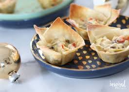 Wonton wrappers, whip cream, fudge, chocolate chips, strawberries. Artichoke Wonton Wrappers