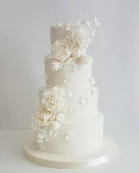 All White Wedding Cake White On White Peonies Roses And Hydrangea Wedding Cake Peonies Wedding Cake Hydrangea Wedding Cake Centerpieces