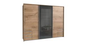 Zwei auf schienen gelagerte schwebetüren lassen sich mühelos in die gewünschte position verschieben. Funktions Kleiderschrank In Plankeneiche Dekor Und Glas Alwara