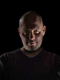 Two portraits here to show how changing the lighting can totally change the  feel of a photograph. The first one is inspired by Albert Watson's portrait  of Steve Jobs and I can't