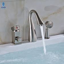 Oil rubbed bronze bathroom luxury shower faucet rain mixer 8 inch round head double cross handle bathroom bathtub hand spray tub tap wall mount bathroom fixtures. Buy Brass Bathroom Tub Faucet 3pcs Bathtub Faucet Hand Shower Faucet Mixer Taps Hot And Cold Water Online