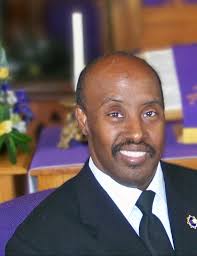 Dennis M. Holmes "Den Den”