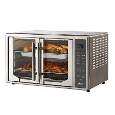 There are three oven racks with 7 rack guides. Oster Digital French Door With Air Fry Countertop Oven Costco