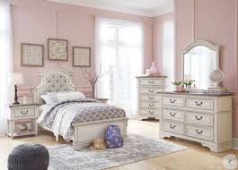More than a place to sleep, the bedroom should be a luxurious retreat. Realyn Chipped Two Tone Youth Upholstered Panel Bedroom Set From Ashley Coleman Furniture