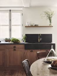 Stunning Black Concrete Farmhouse Sink With Walnut Cabinets Rustic Kitchen Design Kitchen Sink Decor Kitchen Sink Remodel