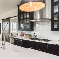 Add a steel chandelier and. Black Kitchen Cabinets Make A Bold Statement 23 Effective Ways Black Kitchen Cabinets Black Kitchens Black Kitchen Decor