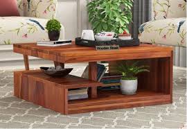 A round table leaves plenty of room for serving food at its centre, but a rectangular table is more flexible for seating extra guests at either end. Coffee Center Table Online Buy Latest Designer Coffee Table Best Price Wooden Street