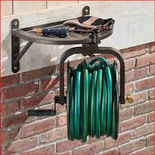 The Perfect Pivot Hose Reel Hammacher Schlemmer Garden Hose Storage Hose Storage Garden Hose Holder