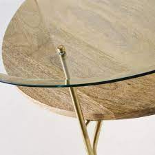 Boho chic style invites itself into your interior with the manilal round coffee table. Round Tempered Glass And Solid Mango Wood Coffee Table Sola Maisons Du Monde