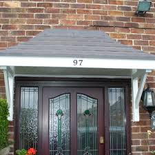 What kind of roof is a door canopie made of? Door Canopies First Stop Home Improvements